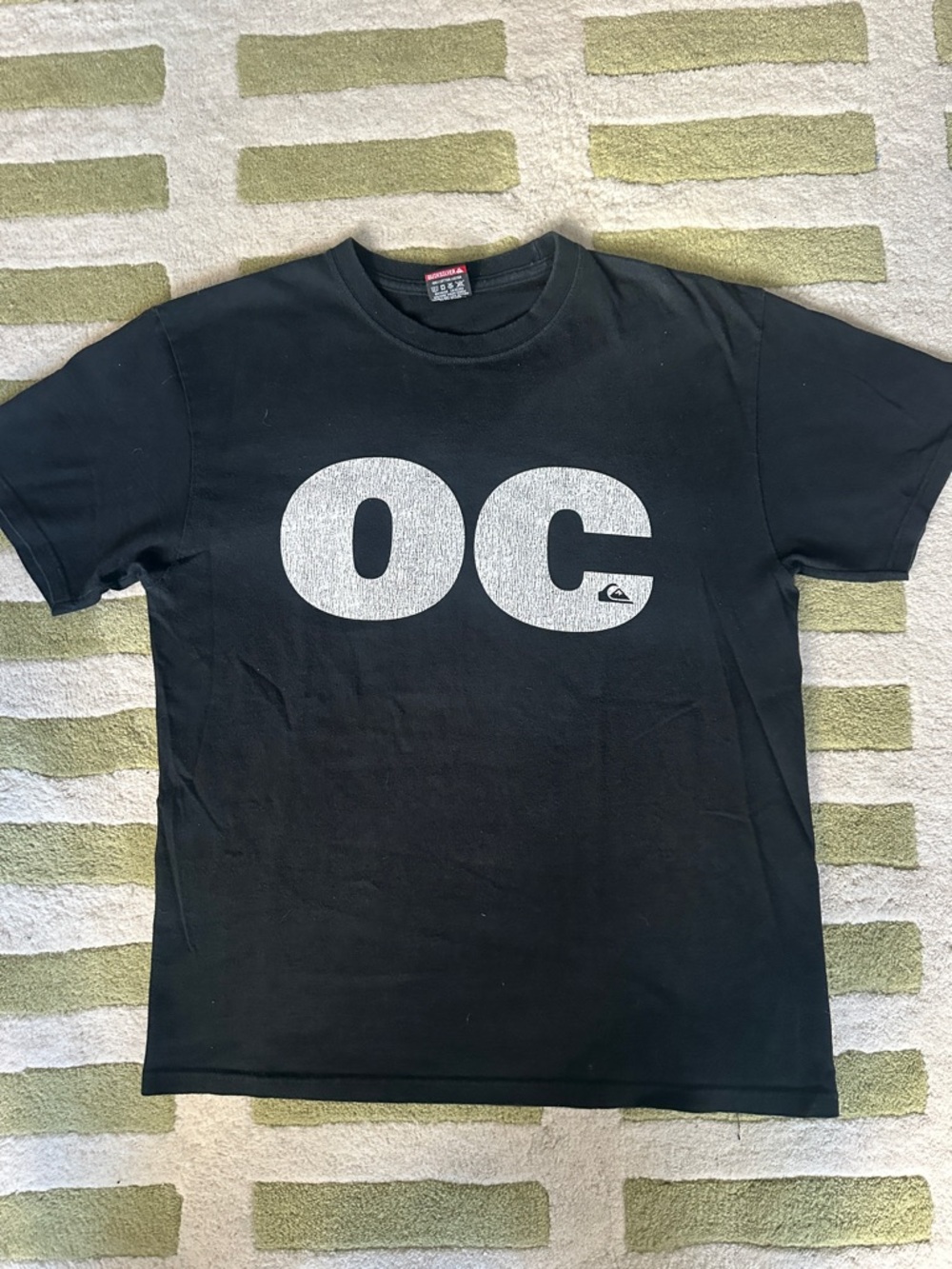 Vintage Quiksilver Black Short Sleeve Tee with White OC Graphic
